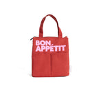 Burgundy Bon Appetit Isothermic lunch bag with pink logo and sturdy handles.